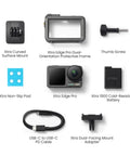 Top view of Knockout 4K Action Camera accessories including mounts, battery, and cables for adventure sports.