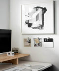 Office wall with Quartz Plastic Spring Clips 8 Pack For Dorm Décor Damage Free Hanging, holding notes and a small calendar.
