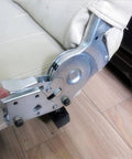 Close-up of Heavy Duty Sofa Bed Hinges With Self Locking Telescopic Ladder Joint Folding Hinge Connectors on a sofa corner.