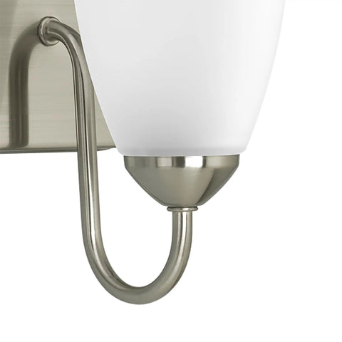 Close-up of the Gather Collection Three Light Bath Vanity Light with etched glass shade and brushed nickel finish, side view