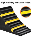 Two Pack Heavy Duty Extra Large Solid Rubber Wheel Chocks With Portable Handle For Travel Trailer, Truck, RV And Commercial Vehicles Keeps Wheels In Place On Driveways, Ramps And Campsites with high visibility reflective strips.
