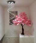 87 Inch Crystal Chandelier With Spiral Design, 6 Light Modern Ceiling Light For High Ceilings, shown near pink decor