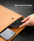 Hand placing 20W Fast Wireless Charging Pad For iPhone 17 16 15 14 13 12 SE AirPods Samsung Galaxy S25 S24 into slim brown pouch