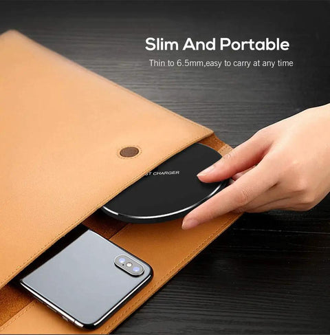 Hand placing 20W Fast Wireless Charging Pad For iPhone 17 16 15 14 13 12 SE AirPods Samsung Galaxy S25 S24 into slim brown pouch