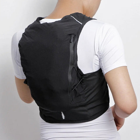 Back view of a Hydration Vest For Hiking And Trail Running With 2L Bladder Lightweight Nylon TPU Water Pack For Men And Women Hands Free Hydration Durable Outdoor Gear Black Large
