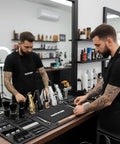 Barber preparing tools on Modular Magnetic Barber Mat Set With Five Strong Magnets Extra Large Non Slip Rubber Barbershop Station Mat.