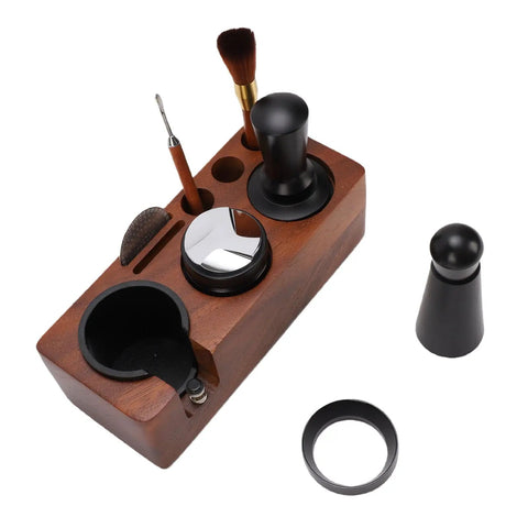 Portable Solid 58mm Stainless Steel Coffee Tamper Kit With Wooden Tamping Station showing tamper, brush, and tools on a wooden base.