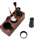 Real Deal 58mm Espresso Tamper Set With Solid Wood Station features wooden base, stainless steel tamper, and cleaning brush.