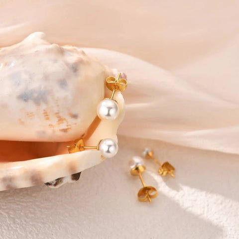 Five Piece Pearl Stud Earrings Set With Gold Finish Ball Studs From 4mm To 8mm For Women And Men, Classic Gold Pearl Earrings For Everyday Wear, Dope For Multiple Piercings And Modern Day Style. Gold pearl stud earrings on seashell