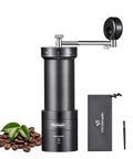 Portable Manual Coffee Grinder With Foldable Handle And External Adjustment For A Clean Grind Aluminum Body And Stainless Steel Burr For Consistent Espresso And Drip Grinds Ideal For Travel Camping And Home Use On The Go, shown with coffee beans and storage pouch.