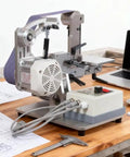 Tough As Nails 750W Belt Polisher And Grinder For Woodworking Trimming Sanding with aluminum body on a wooden workbench.