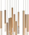 Slick Rock Crystal And Glossy Gold Finish 12 Light Modern Pendant Hanging Light With Adjustable Cord Suspension For Kitchen Islands Diaphane Collection, showcasing hexagonal glass tubes and gold accents.