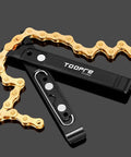 4 In 1 Bike Chain Quick Link Tool With Master Link Pliers, black tool with gold chain against gray background