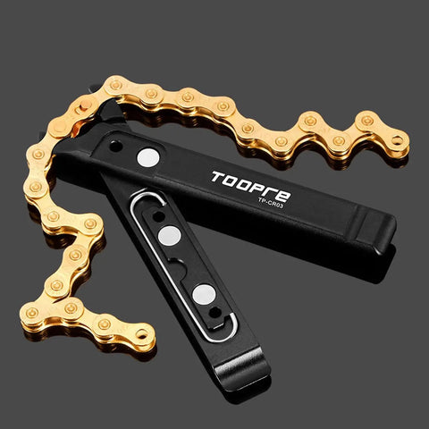 4 In 1 Bike Chain Quick Link Tool With Master Link Pliers, black tool with gold chain against gray background