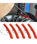 Red 5 Piece Tire Changer Rim Protectors Premium Soft Polyurethane Wheel Savers in use during tire installation.