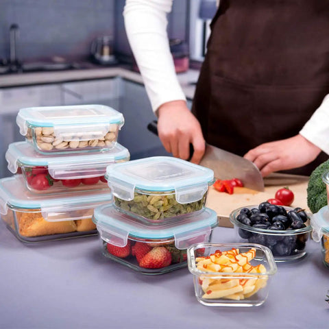 Glass Meal Prep Containers Set With Lids 18 Piece Storage Containers Airtight Leak Proof, filled with various foods and vegetables on a kitchen counter.