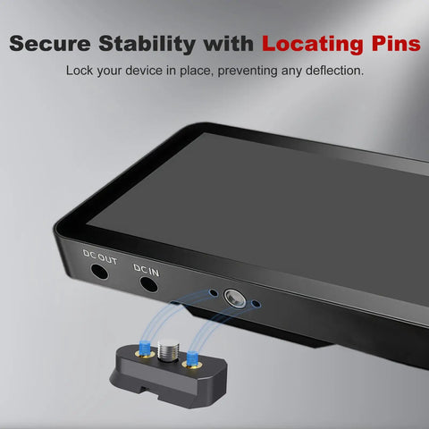 Compact Aluminum Quick Release Plate System With One Quarter Inch Screw For Camera Tripods detail next to monitor