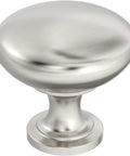 Top Notch Ten Pack Of 1.25 Inch Round Cabinet Knobs With Slick Satin Nickel Coating For Kitchen Drawers Offering A Clean Look And Rock Solid Build Quality That Really Delivers, close-up view of a satin nickel cabinet knob.