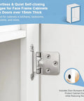 Soft Close 1/2 Overlay Brushed Nickel Kitchen Cabinet Door Hinges For Face Frame Cabinets mounted on a white cabinet door.