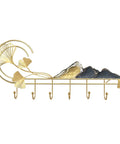 Modern Wall Mount Coat Rack Featuring Seven Heavy Duty Metal Hooks That Truly Knock Your Socks Off For Entryway Organization Hat Jacket Scarf Display Slick Home Upgrade in gold with decorative mountain and leaf design.