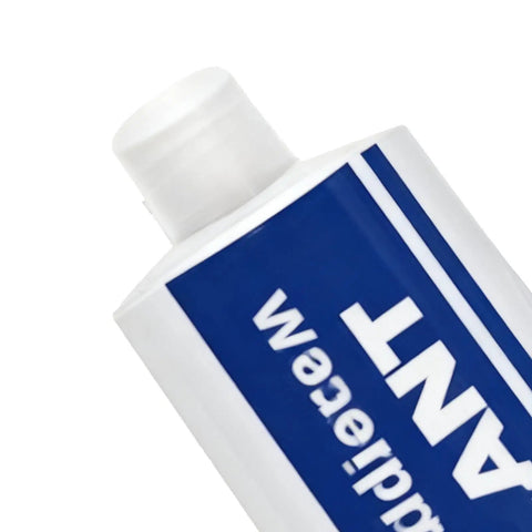 Close-up of Zero Sweat Multi Material Sealant tube showing cap, ideal for home repairs and auto fixes with waterproof adhesive.