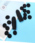 1000 Piece Black Latex Finger Sleeves Block Sneaky Sweat Smudges And Greasy Fingerprints From Messing With Pristine Hardware For Tough Shop Floor Crews And Weekend Gearheads Fixing Tight Builds on a blue background.