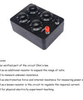 Resistance box with five dials in a black plastic case and red/black banana plug terminals.