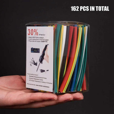 Hand holding clear box with 162 pieces of Two To One Heat Shrink Tubing Set With Flame Retardant V0 Rating, Nine Colors, Six Diameters