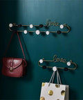 Fresh Dope Wrought Iron Love Shaped Wall Mount Hooks For Entryway Storage Black Metal Key Holder And Coat Rack Perfect Fit For Living Room Bedroom Decor Setup with bags hanging