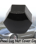 Dope Glossy Black 24 Pack Wheel Lug Nut Cover Caps With 21mm Inner Hex for Tesla Cybertruck Model Y and Model 3 shown outdoors