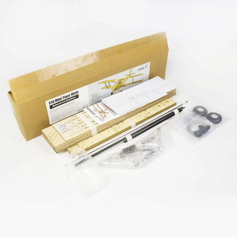Box and contents of 39 Inch Mini Tiger Moth Balsa Wood RC Airplane Kit With Laser Cut Parts Unassembled Dope DIY Flying Model