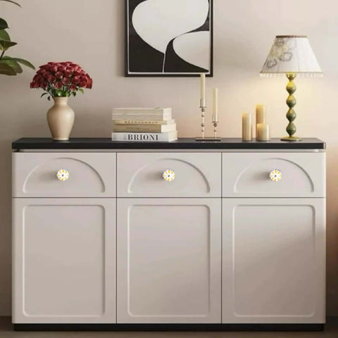 Set Of 8 Yellow And White Vintage Ceramic Drawer Knobs With Classic Spade Cabinet Door Pulls on a smooth white cabinet.