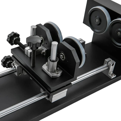 Close-up of Rock Solid Rotary Attachment For Precision Engraving And Wood Carving heavy-duty aluminum build with pulleys and adjustable knobs.