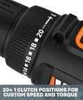 Close-up of 20V Drill Driver Built For Big Jobs With Three Eighths Inch Chuck, 20 plus 1 clutch settings visible on black and orange body.
