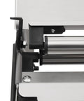 Close-up of the stainless steel mechanism in the Rock Solid No Sweat Hand Cling Wrap Sealer And 18 Inch Food Packaging Machine.