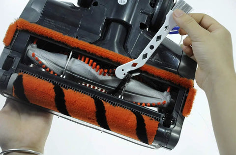 Close-up of All In One Replacement Kit for Ion Flex DuoClean Vacuum showing brush roll and cleaning tool installation.