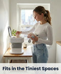 Woman using Portable Folding Washing Machine With 12 L Mini Capacity perfect for college dorms, fitting into small spaces.