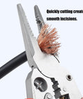 Heavy Duty Stainless Steel Wire Stripping Tool cutting copper wire for electrical repair, showcasing ergonomic handle design.