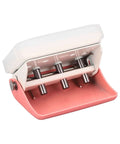 Three Hole Punch Handheld Paper Puncher With Five Sheet Capacity And Alignment Posts for B5 A5 A4 A6 A7, pink metal, angled view