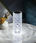 Lit Crystal Diamond Portable Table Lamp With 3 Color Touch Control on marble table, glowing like a diamond