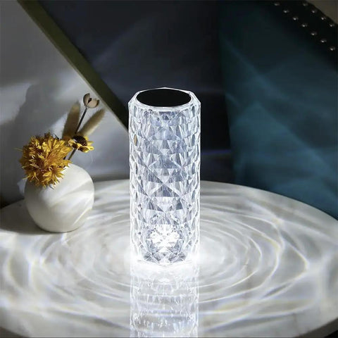 Lit Crystal Diamond Portable Table Lamp With 3 Color Touch Control on marble table, glowing like a diamond
