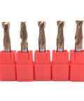 Solid As A Rock Two Flute Carbide End Mill With Alloy Coated Tungsten Steel Body arranged in red safety caps.