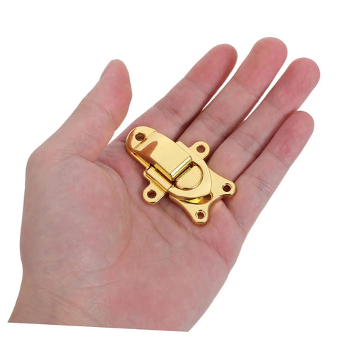 Zerodeko Metal Duckbilled Hasp Lock Toggle Latch Zinc Alloy Material 2pcs held in a hand showcasing its gold finish and design.