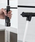 Kitchen Faucet with Pull Down Sprayer, Commercial Spring Single Handle Stainless Steel Sink Faucet, Two Function Spray Head, High Arc Single Hole Kitchen Faucet cUPC/NSF/NSF61 (Black) showing pull-down sprayer in hand.
