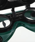 Close-up of Two Pack Kickass Welding Safety Goggles With Quick Flip Cover and Slip Resistant Adjustable Headband showing inner lens design.