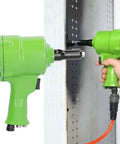 Pro Japanese Style Pneumatic Nail Puller And Air Riveting Machine KP 705P in use removing rivets from a metal panel.