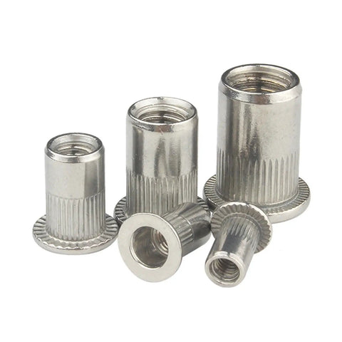 Stainless Steel Flat Head Rivet Nuts For Home DIY And Metal Work Projects Featuring Knurled Bodies That Stop Spinning During Installation To Ensure Super Strong Anchors Every Single Time, assorted sizes.
