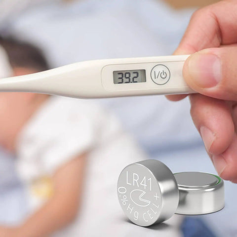 Premium Leak Proof LR41 Button Batteries AG3 Alkaline Cells 10 Pack alongside a digital thermometer reading 39.2 degrees.