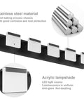 Five Light Matte Black LED Vanity Light Fixture With Acrylic Panels For Bathroom Mirror Cabinet Powder Room And More Dope Modern Sleek Fixture For Bedroom Living Area, showing close-up of stainless steel material and acrylic lampshade details.