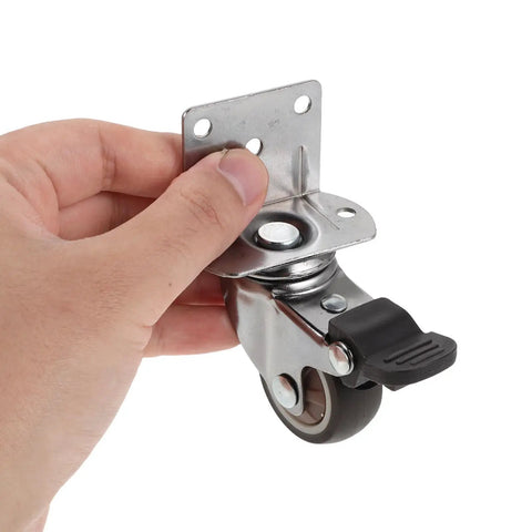 Hand holding 4 Pack 1.5 Inch Side Mount Caster with Locking Brakes, heavy duty TPR wheel, 360 degree swivel, easy install, quiet